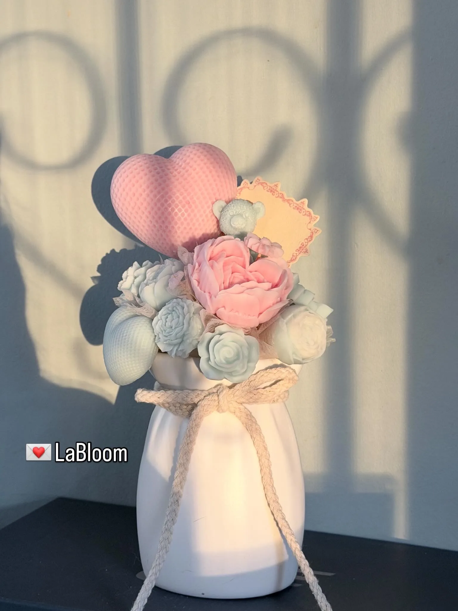Wrapped ribbon bouquet with pink paper