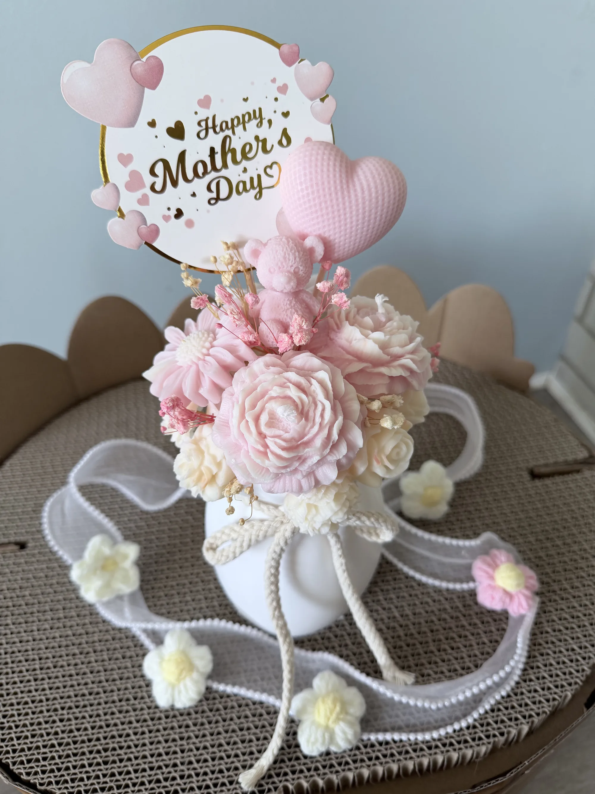 Floral candle bouquet with heart topper