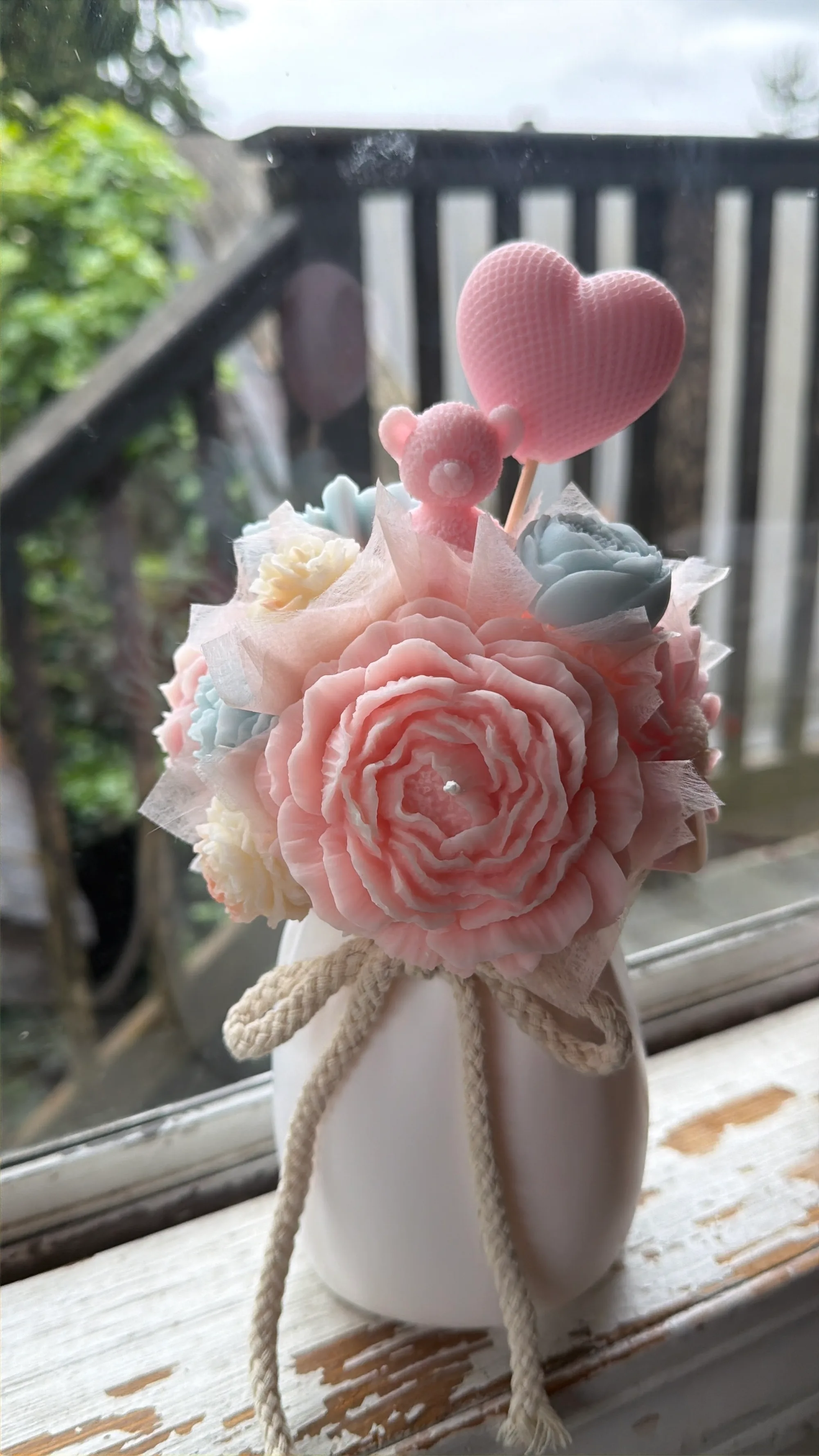 Ceramic vase bouquet with pastel flowers